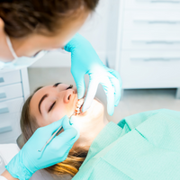 Гингивэктомия в области одного зуба